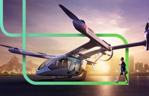 Na imagem o carro voador vai pousando em um heliponto e uma pessoa vai se aproximando do veículo
